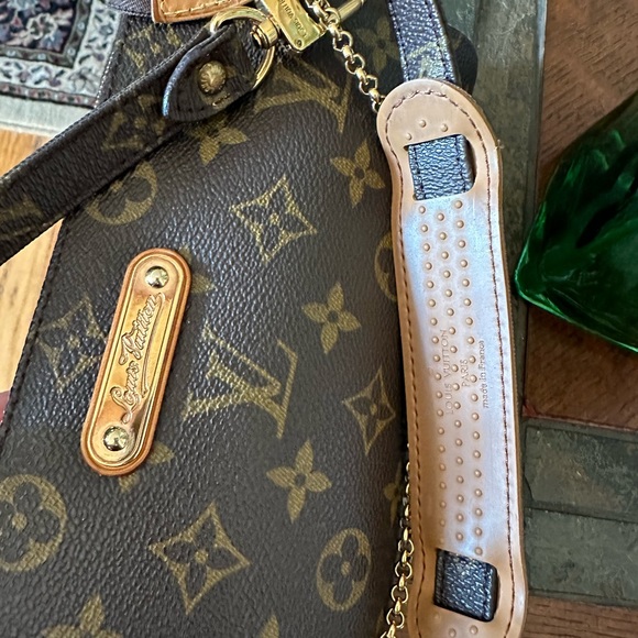 Authentic Louis Vuitton eva.with automatic monogram strap - Picture 6 of 10